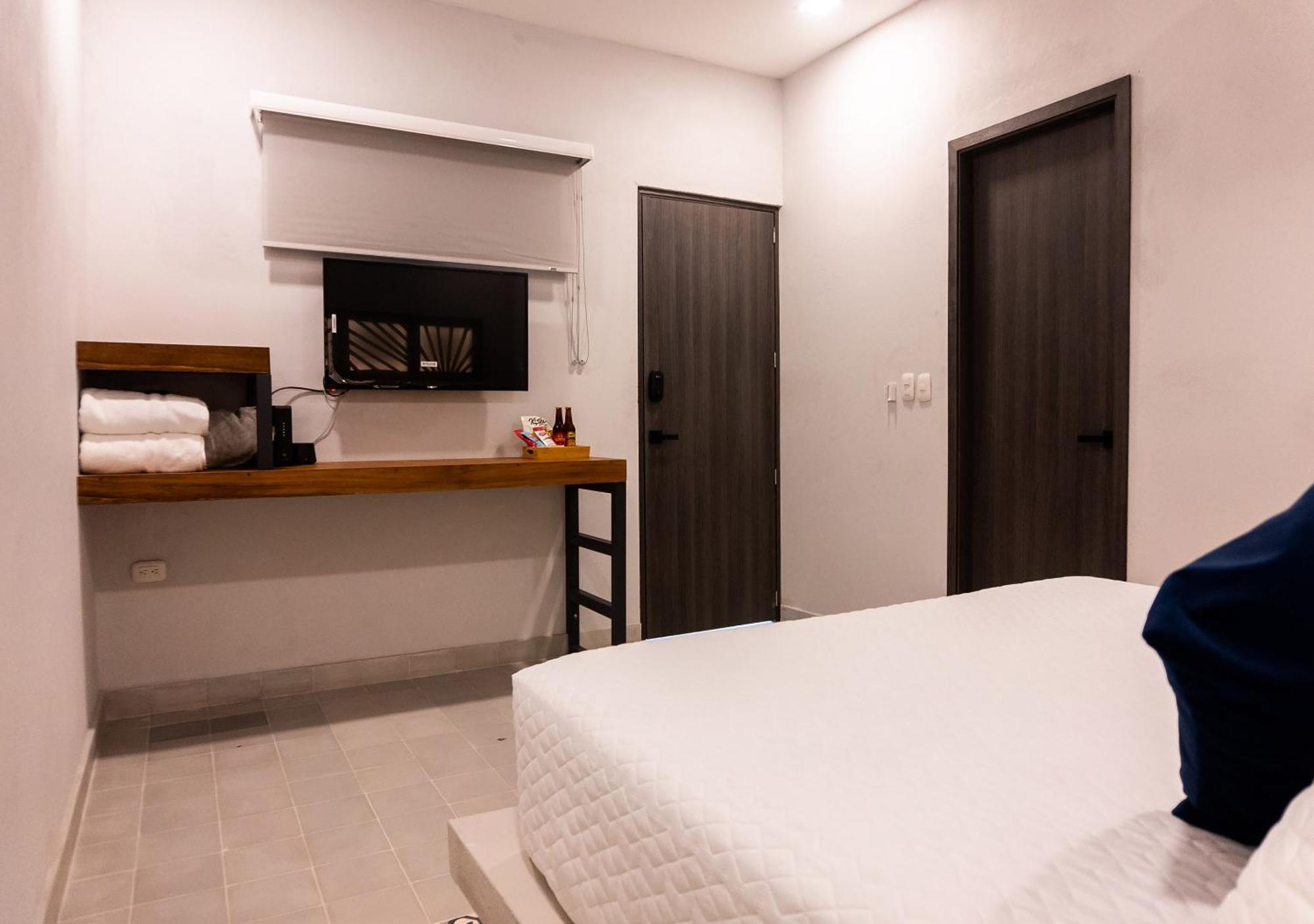 The Garden Suites Santa Marta  Quarto foto